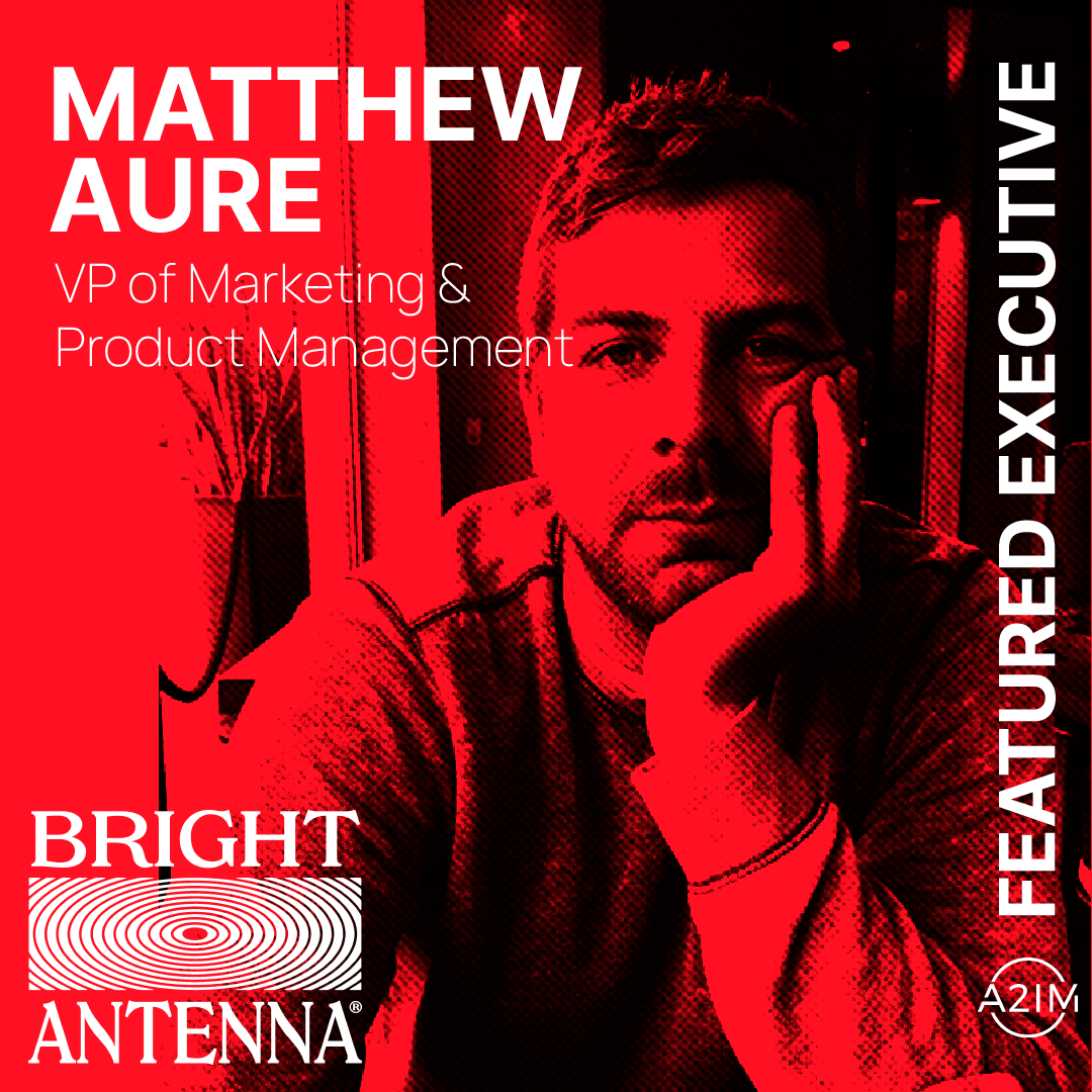 Matthew Aure VP of Marketing and Product Management at Bright Antenna featuring a bold red and black promotional design for FEATUREREEXCLUSIVE on Hypebot.