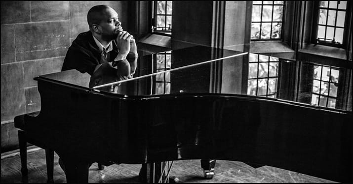 pianist contemplating his composition