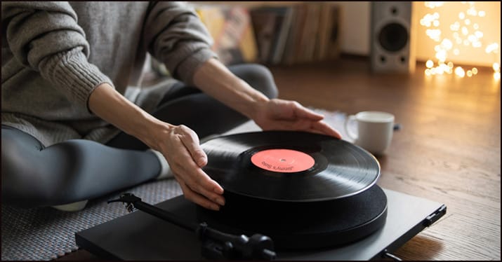 woman listening to Jimmy's solo record