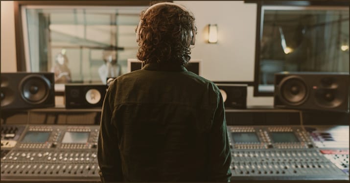 Music producer working in a studio