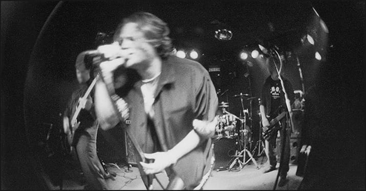 band photoshoot on stage with a fish-eye lens