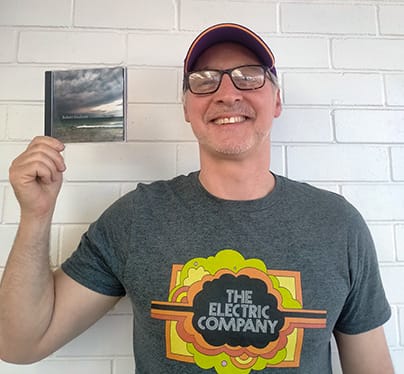 Robert Graham with his music on CD