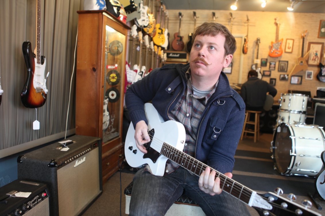 Sean Crowley testing out DiPinto Guitars, photo courtesy of Stokely Barsh. 