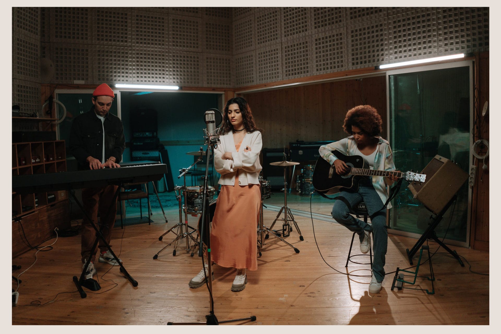 band rehearsing in studio together