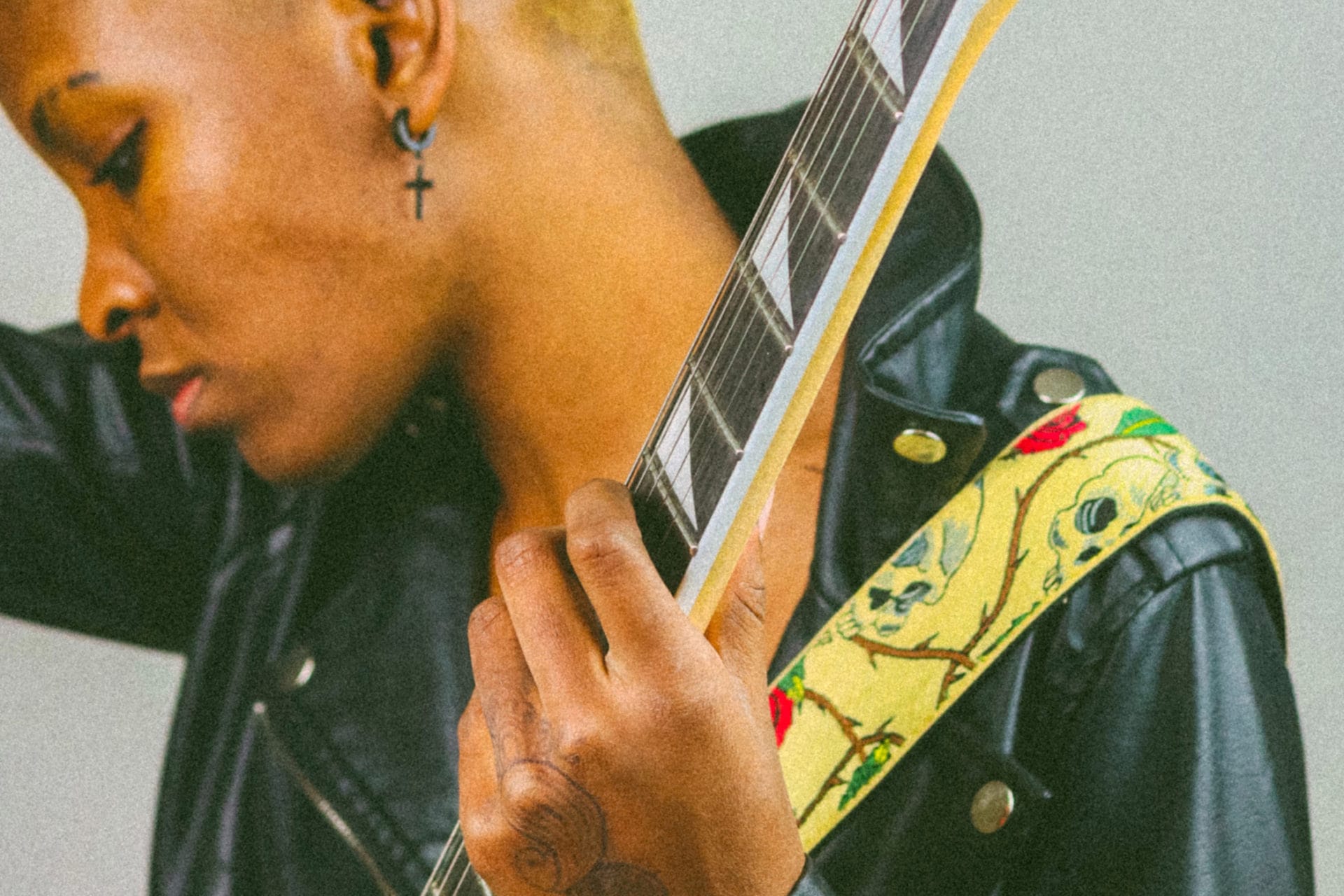 closeup photo of woman with guitar