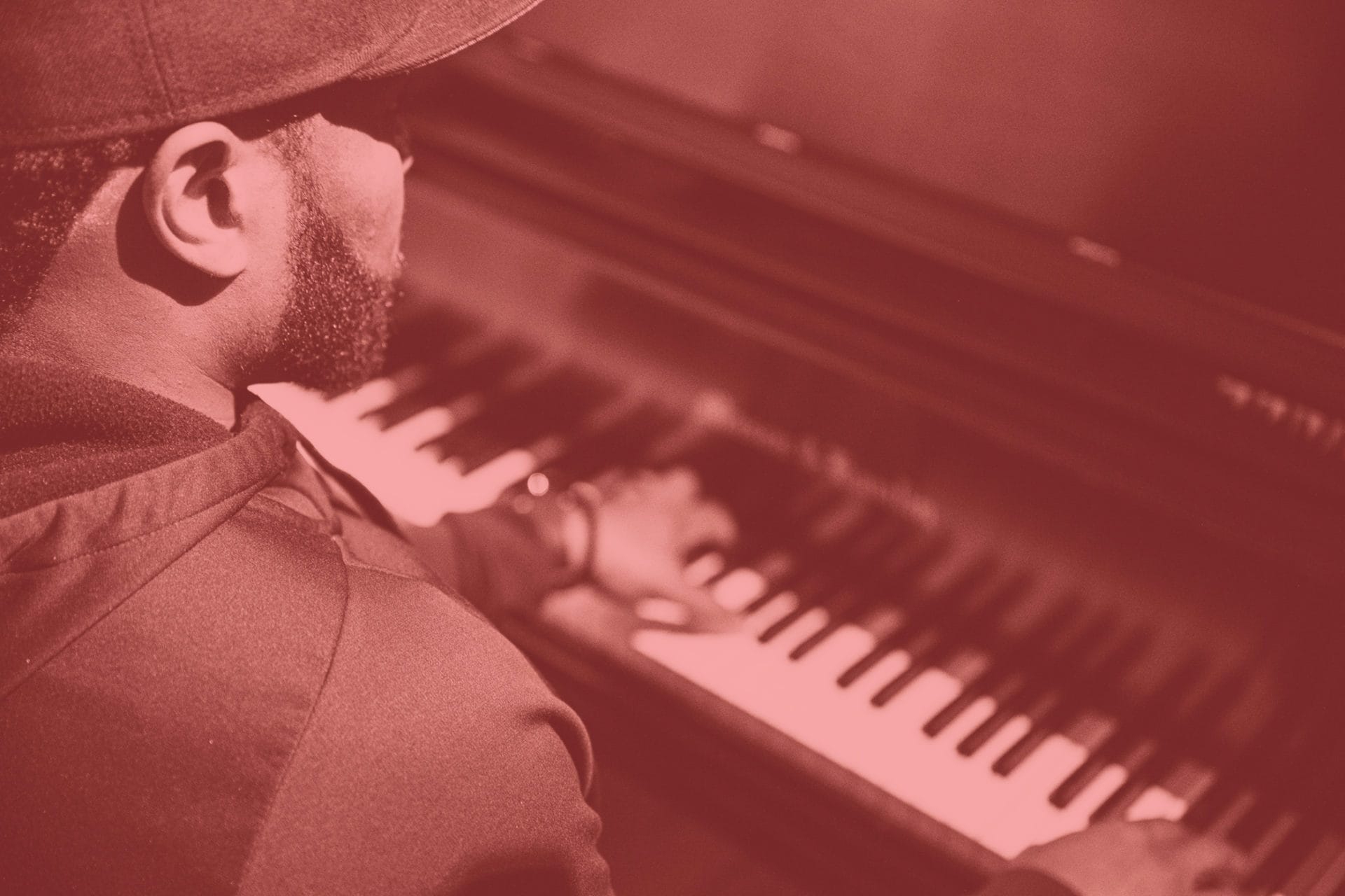 man playing the piano closeup
