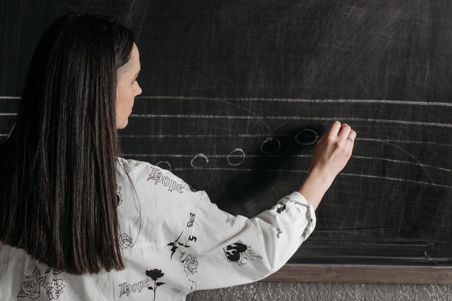 music teacher at the blackboard