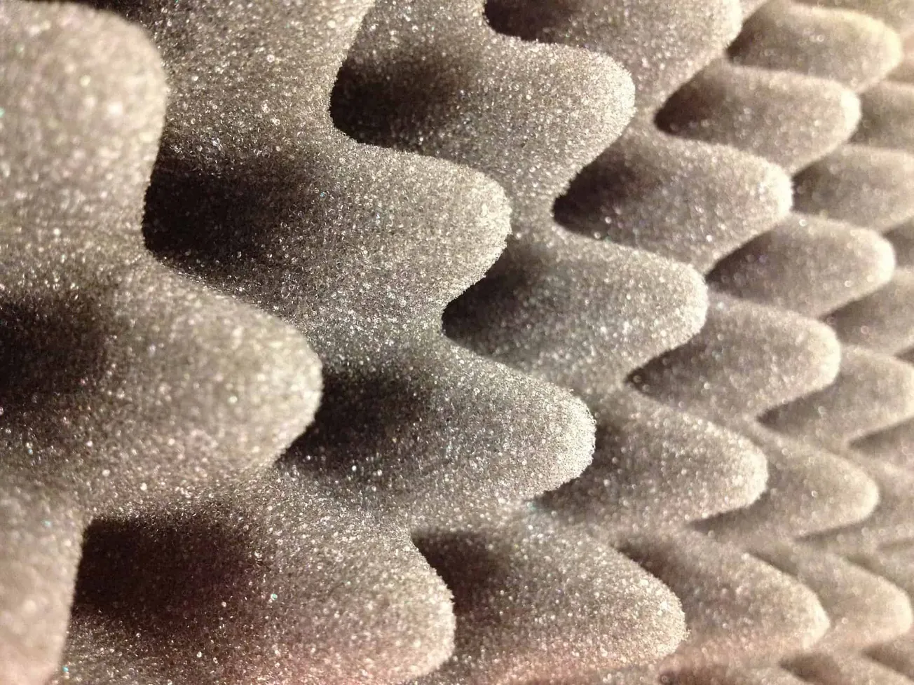 Microfiber foam rollers for acoustic treatment or soundproofing, close-up image highlighting the textured surface and diamond