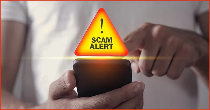SCAM ALERT warning icon on mobile phone, digital security risk, online fraud warning, cybersecurity alert, mobile safety, hac