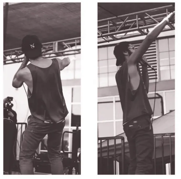 DJ performing live at a music event, showcasing turntables and music equipment for DJ performance, with a focus on music indu