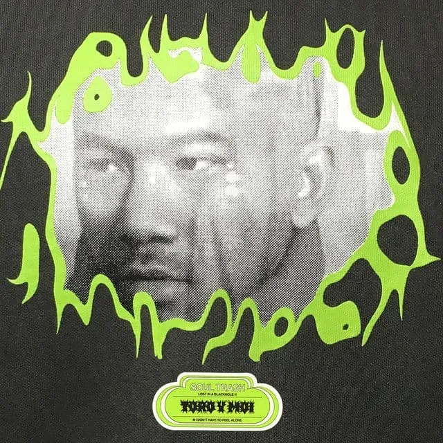 A vintage black-and-white portrait of a man surrounded by neon green graffiti-style design.