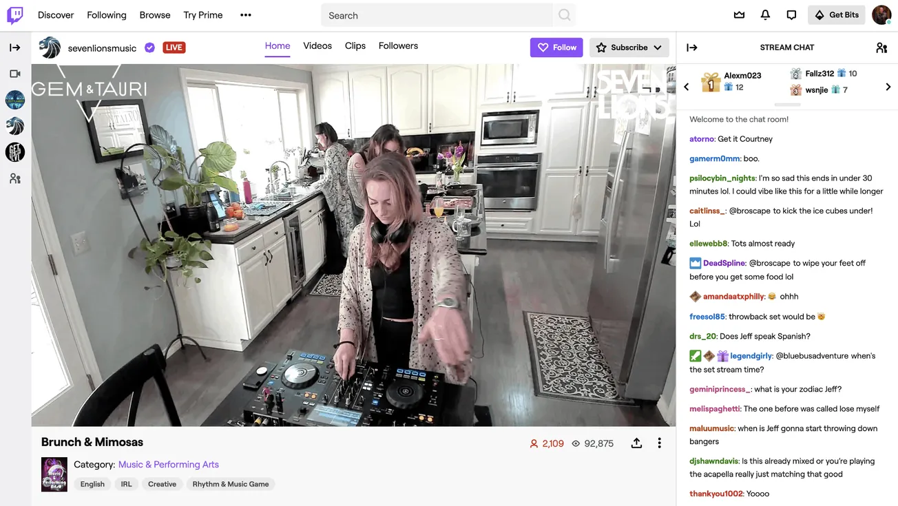 DJ woman mixing music at a kitchen-themed live stream event, showcasing the intersection of music performance and casual home
