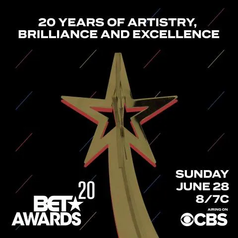Elegant BET Awards trophy with gold finish and red accents, celebrating 20 years of artistry and excellence, set against a bl