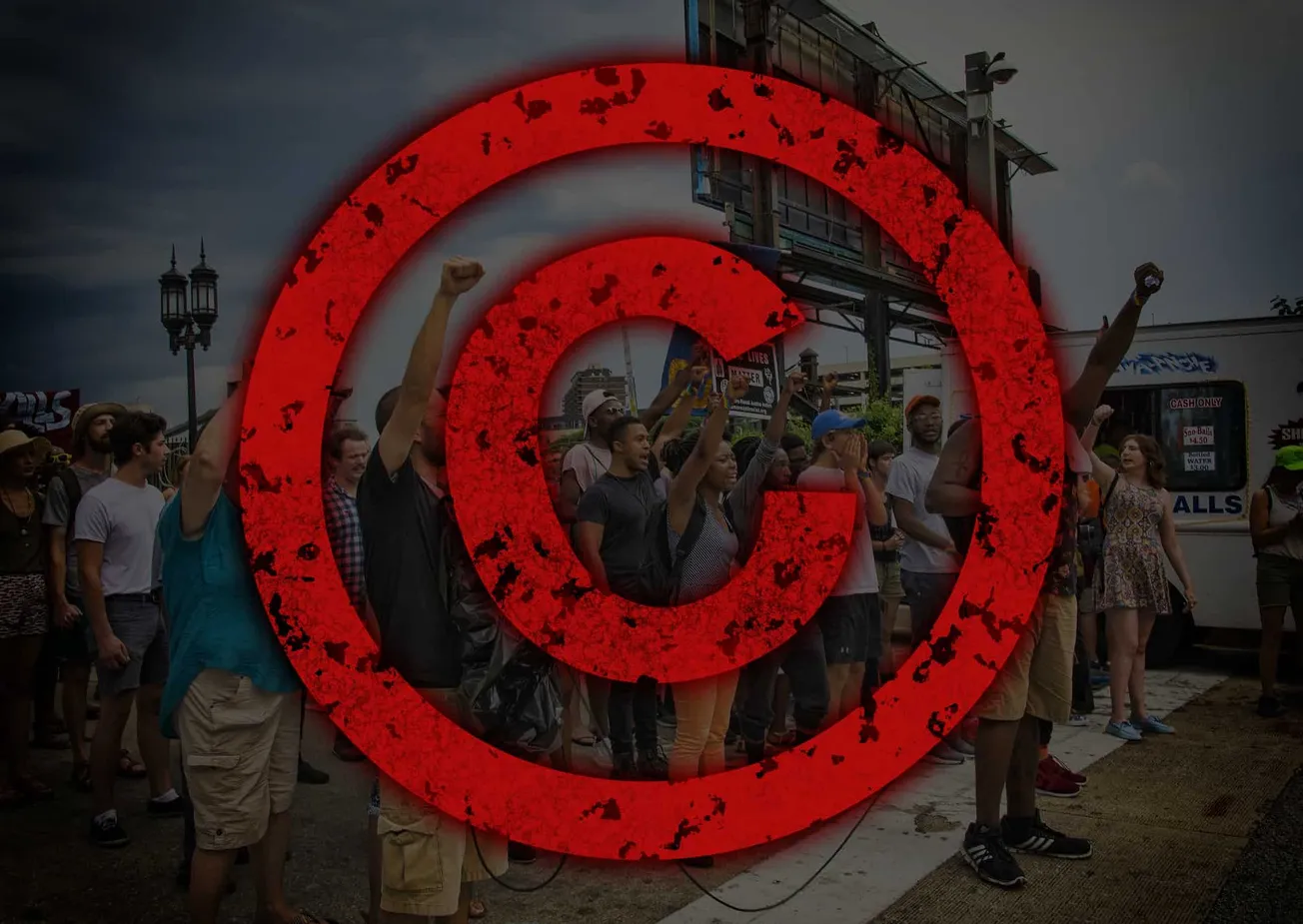 Protest crowd at a rally with a large red Target logo overlay, emphasizing activism, social movements, and community engageme