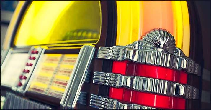 Jukebox with colorful buttons and retro design, nostalgic music player for entertainment and vintage decor.