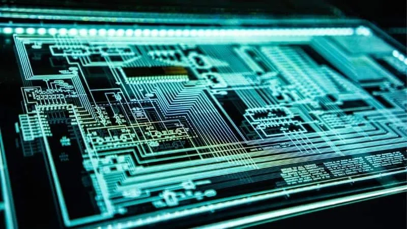 Futuristic digital circuit board with glowing blue lines, representing technology, innovation, and digital solutions. Suitabl