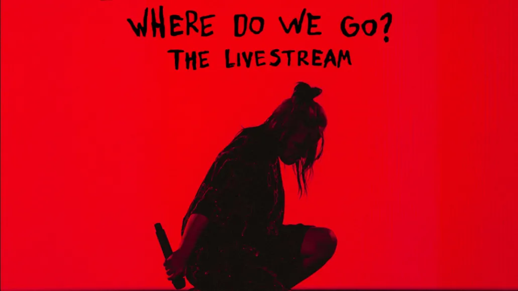 Shot of a female musician with a microphone in hand, kneeling on stage with a red background, promoting livestream concert an