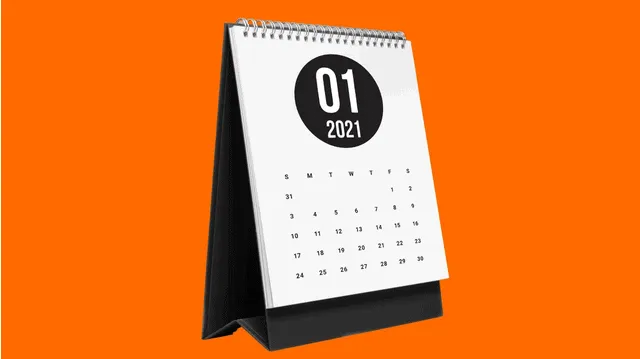 2021 January desk calendar on orange background for business, marketing, and scheduling planning.