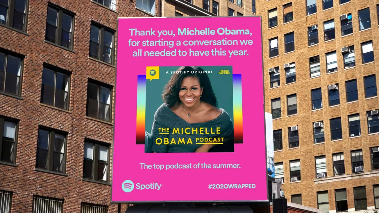 Michelle Obama on podcast billboard in urban setting, celebrating seasons of conversations, featuring Spotify and hashtag #20