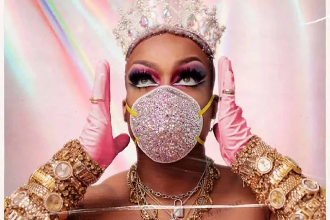 Exuberant woman wearing a glittering face mask and jewelry, embracing vibrant pink gloves, colorful makeup, and a jeweled cro