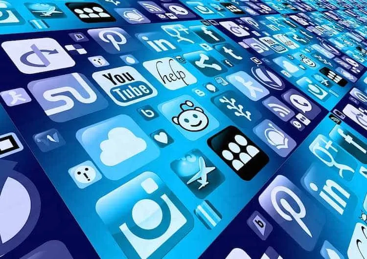 Alt text: A diverse array of social media icons in various shades of blue, including Facebook, Twitter, Instagram, LinkedIn,