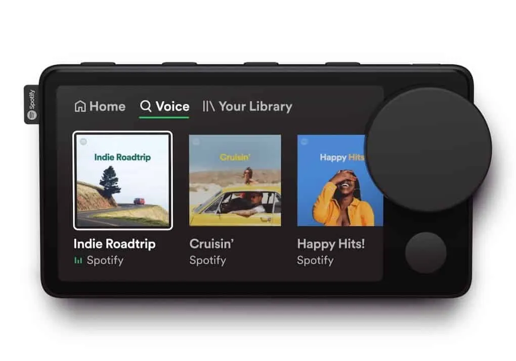 Playable music Spotify playlist interface on a digital music device with curated playlists involving indie rock, cruising, an