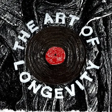 Vibrant red vinyl record with bold text "The Art of Songwriting" overlay, set against a textured black and white background,