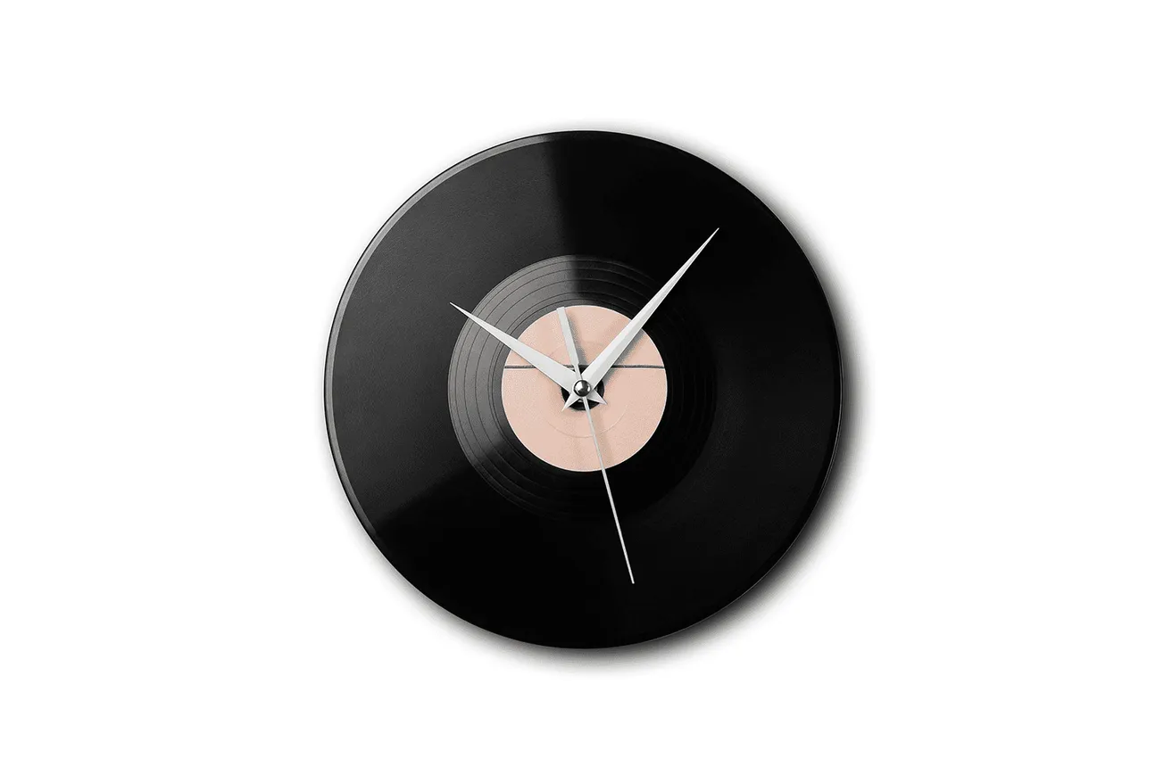 Vintage vinyl record wall clock with modern minimalist design and metal clock hands. Perfect for music lovers and stylish hom
