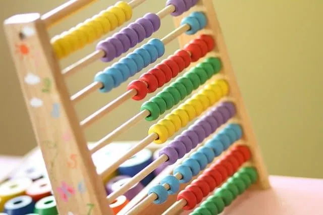 Colorful wooden abacus with beads for early childhood education and learning math skills.