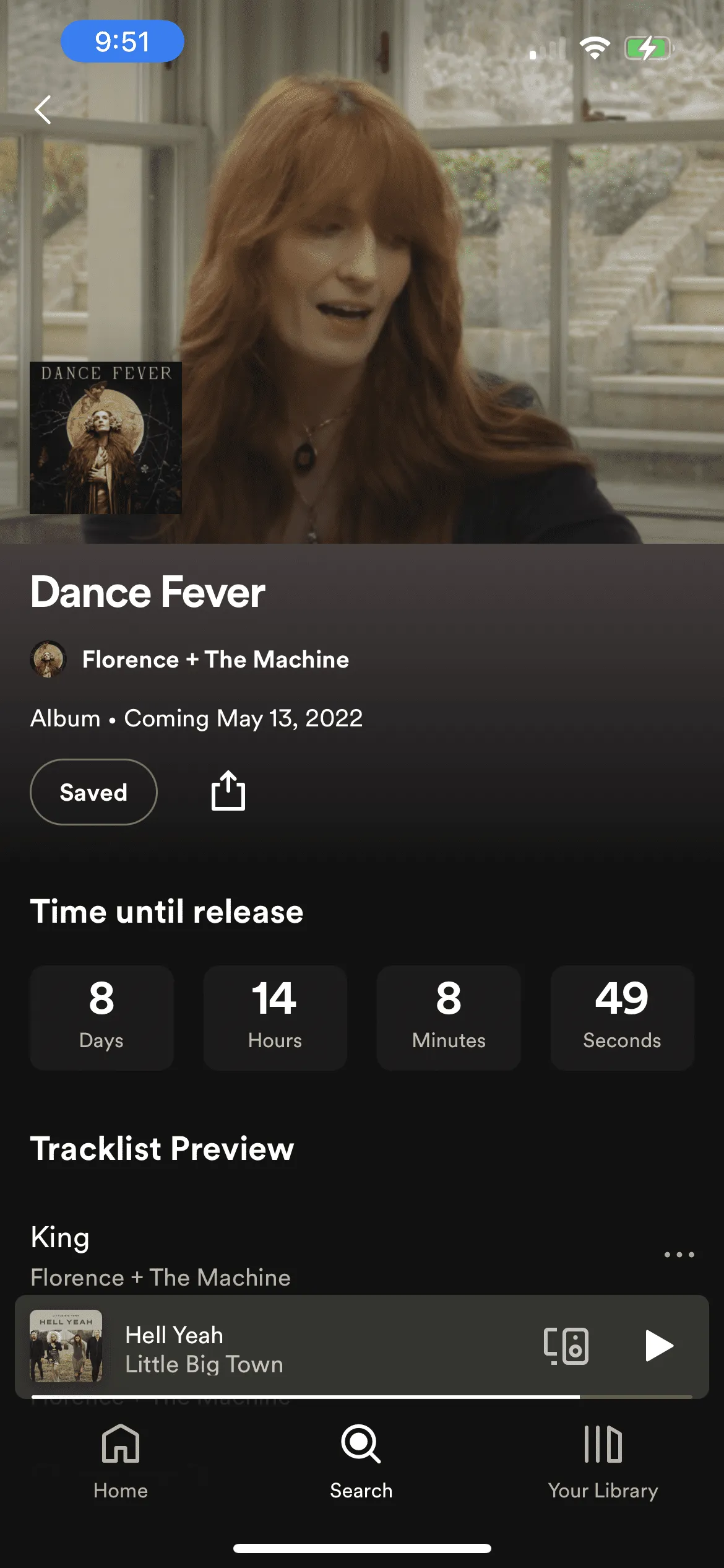 Dance Fever album cover featuring Florence + The Machine with a woman singing in a cozy indoor setting.