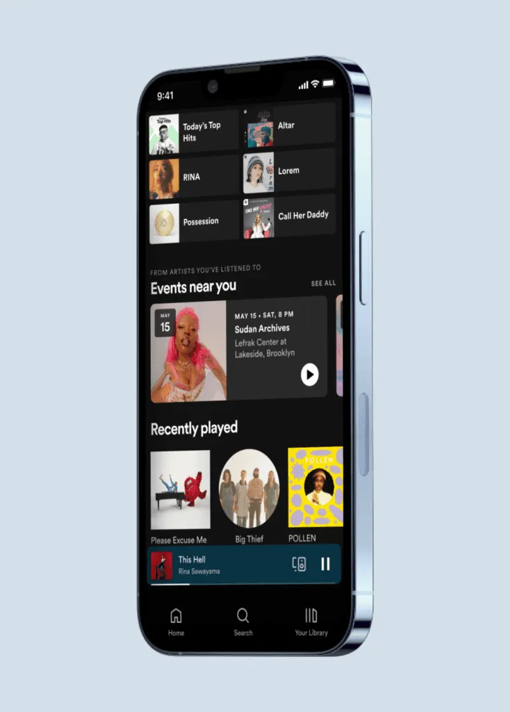 Music streaming app interface on smartphone with top hits, events, and recently played features, highlighting music discovery