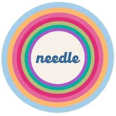 Bright colorful concentric circles with the word "needle" in the center, representing creativity and branding in digital medi