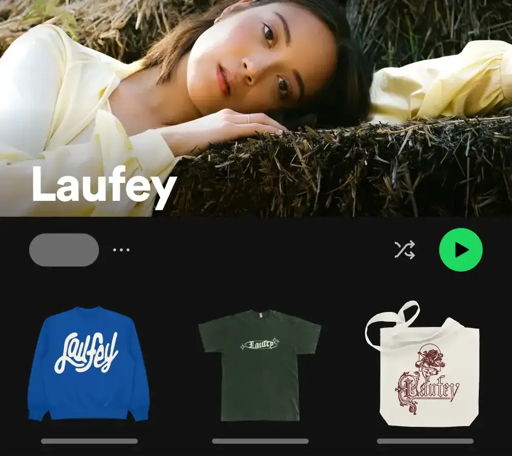Laufey artist merchandise, including sweatshirt, T-shirt, and tote bag, featuring stylish designs and logo, perfect for fans