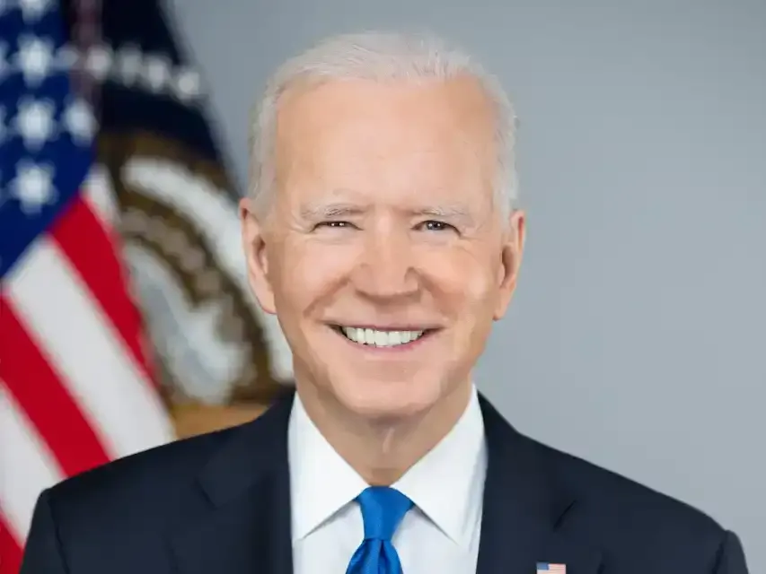 Official U.S. President Joe Biden smiling in front of American flag, political leader, government, presidential portrait, pol