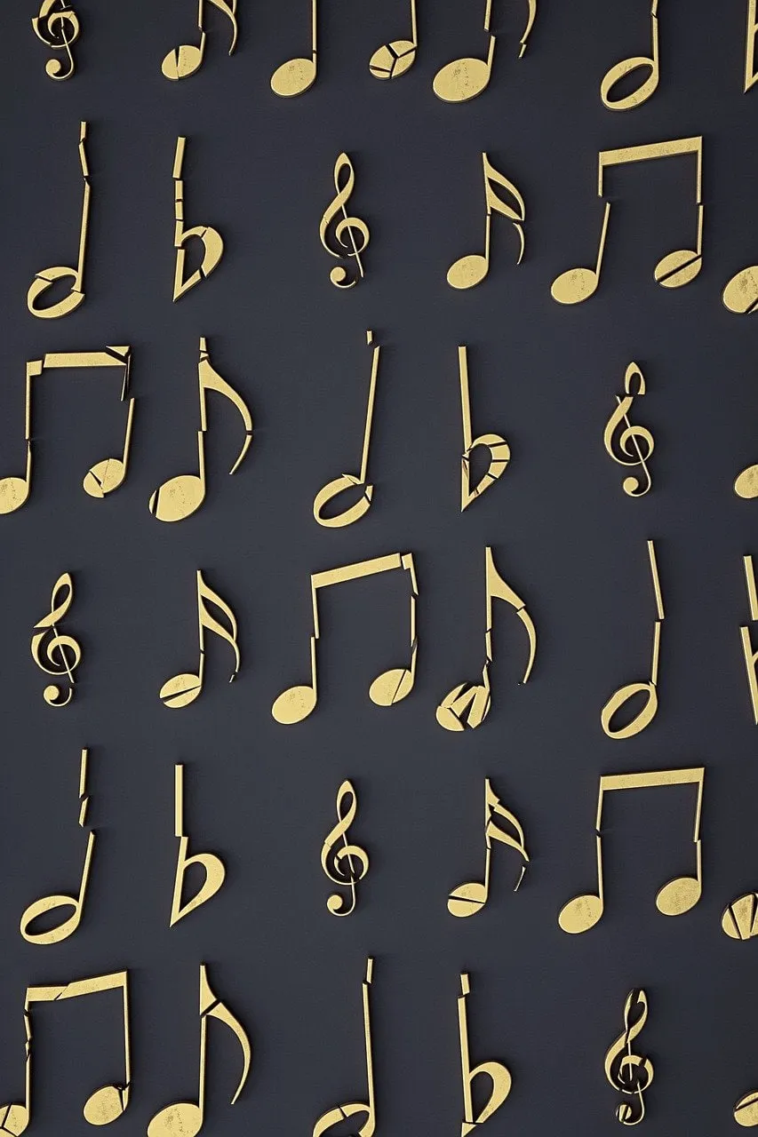 Shiny gold musical notes and symbols on a dark background representing music, rhythm, and sound for music industry branding a