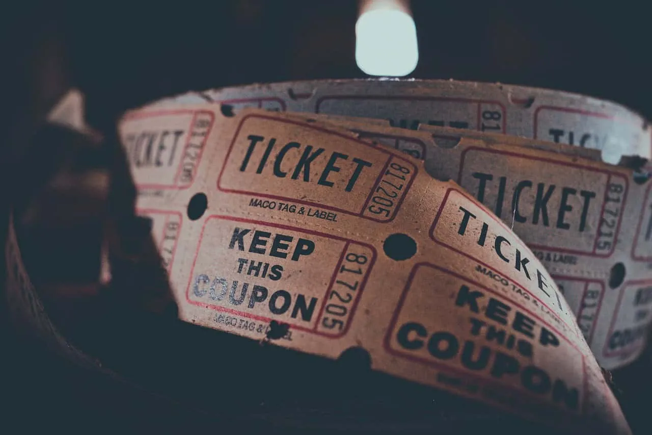Tickets, concert tickets, event tickets, keep this coupon, paper tickets, crowd entrance, event admission, printed tickets, t