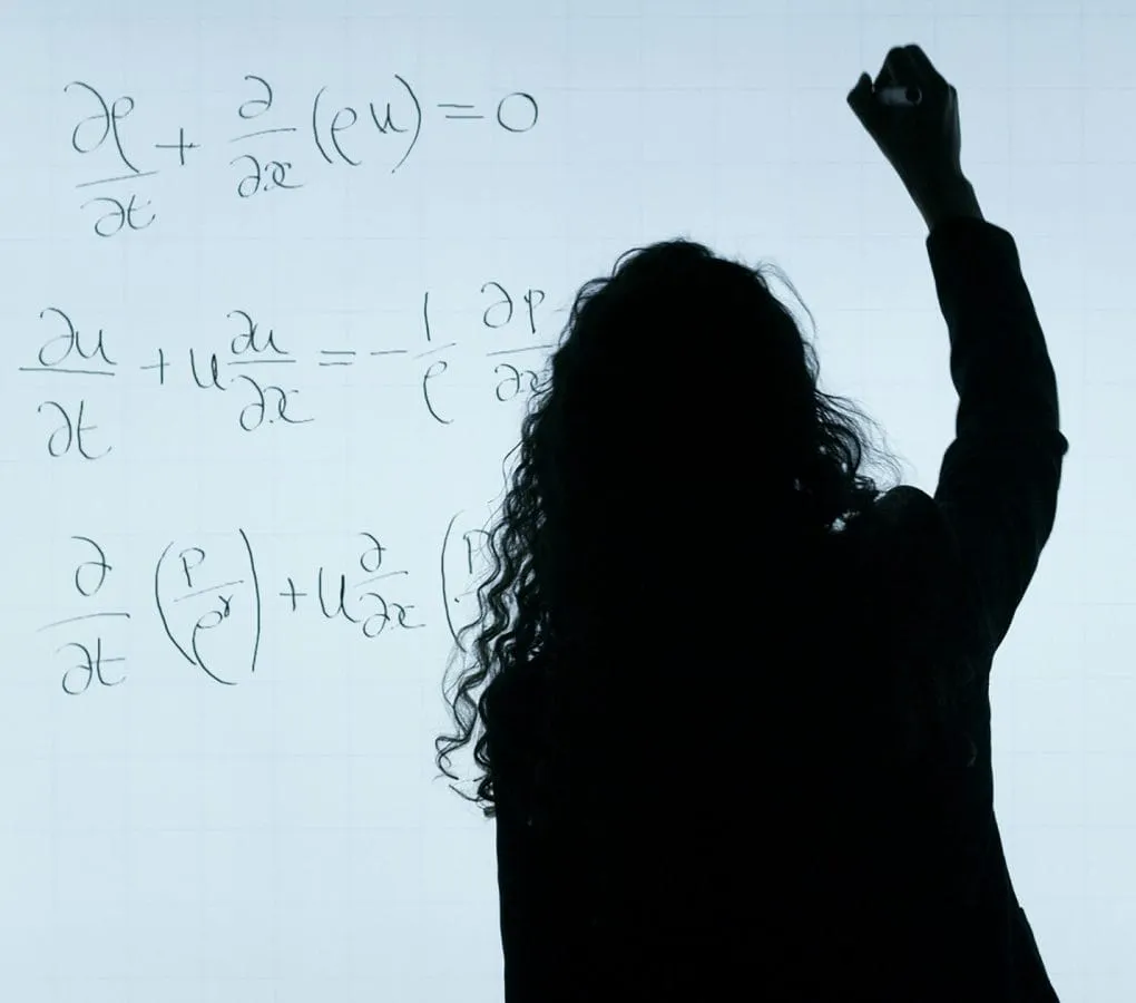 Mathematician solving complex equations on a whiteboard, illustrating advanced mathematical concepts and research.
