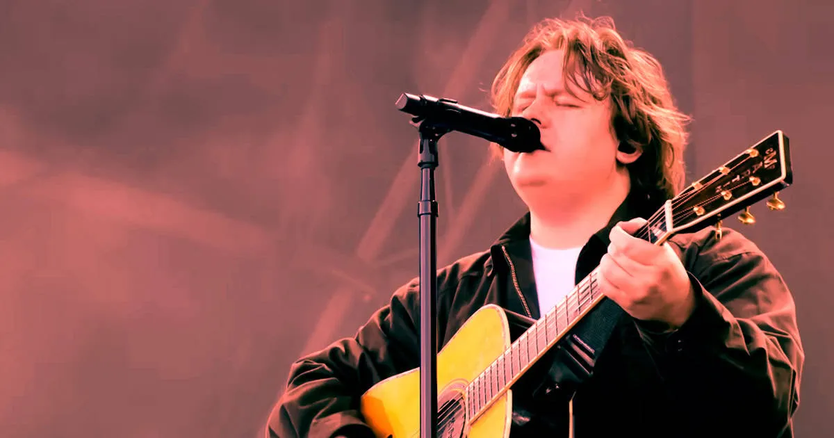 A young musician passionately singing and playing acoustic guitar at a live performance, capturing the essence of indie and s