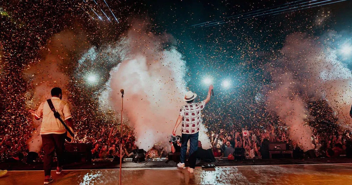 Bruno Mars entertaining a crowd on stage