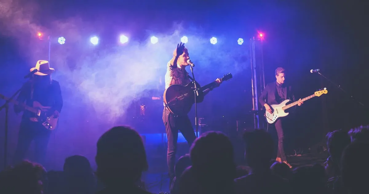 live band performing to a packed crowd.