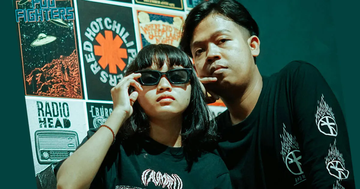 two friends wearing band merchandise