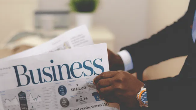 Business news, financial newspaper, market analysis, economic updates, professional reading, corporate finance, investment ne