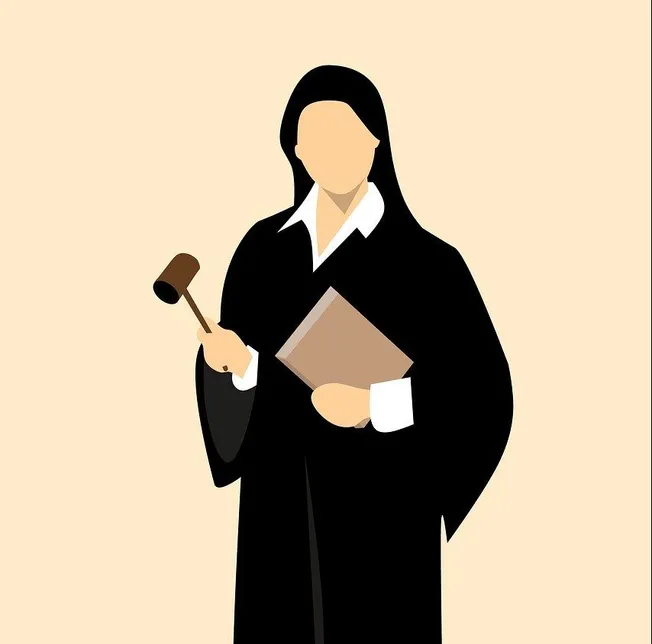 Female judge holding a gavel and legal document, symbolizing justice and law.