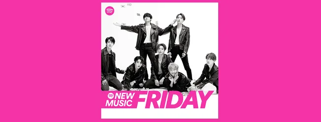 Charming K-pop group members in stylish leather jackets posing for promotional photo with vibrant pink background and Spotify