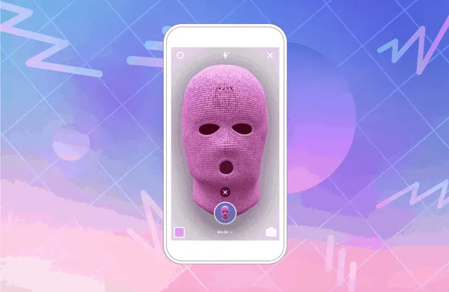 Pink knit ski mask with eye and mouth cutouts showcased on a smartphone screen for digital art or tech innovation.