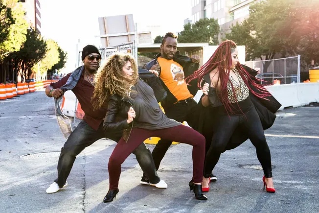 Vibrant urban scene featuring diverse group of friends in dynamic poses, stylish fashion, and confident attitudes, showcasing