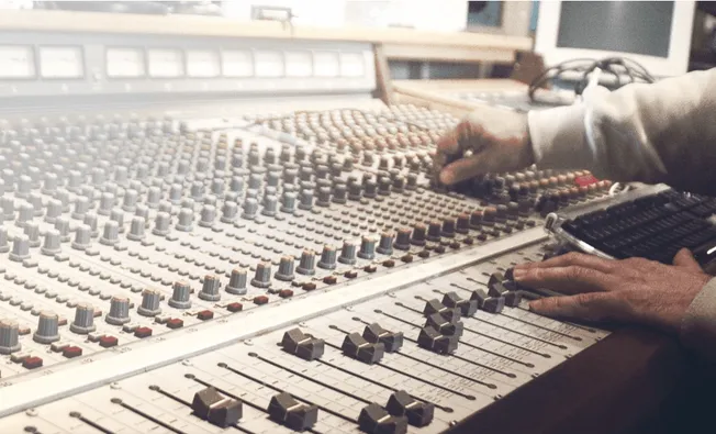 Professional audio mixing board used for music production and sound engineering at Hypebot.