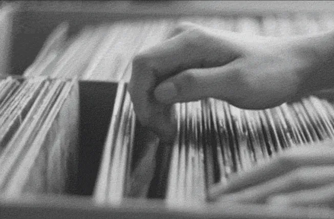 Projected hand flipping through paper documents, data analysis, information processing, digital information, modern business