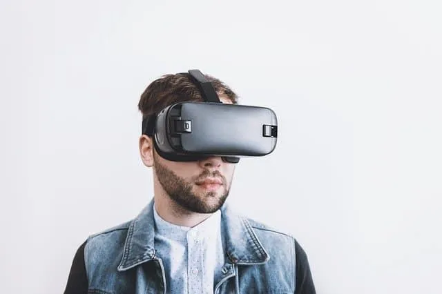 Virtual reality user wearing a VR headset, exploring immersive digital environments, modern technology, virtual reality exper