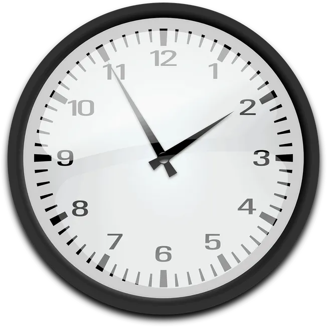 Pastel color clock showing time close to 2:53, with black frame and white face, on a black background, symbolizing time manag